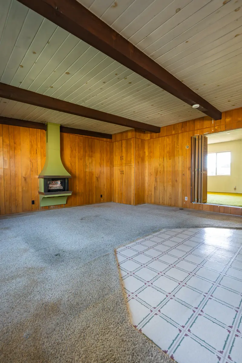 Family room fireplace, beams and tile hearth